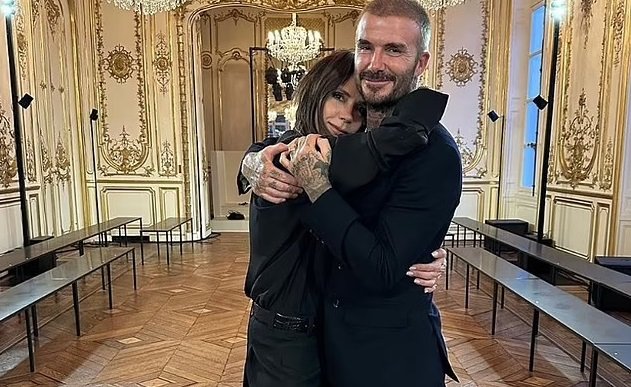 David Beckham showers wife Victoria Beckham with compliments as he posts an adorable picture of them embracing at her immensely triumphant Paris Fashion Week presentation, with a heartfelt message from son Romeo praising the talented designer.