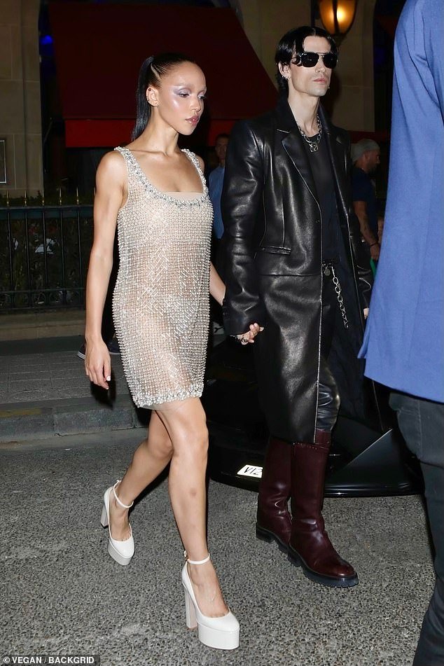 FKA twigs Makes Rare Appearance with Boyfriend Jordan Hemingway in Paris, Flaunting Lingerie Beneath a Stunning Gold Beaded Dress