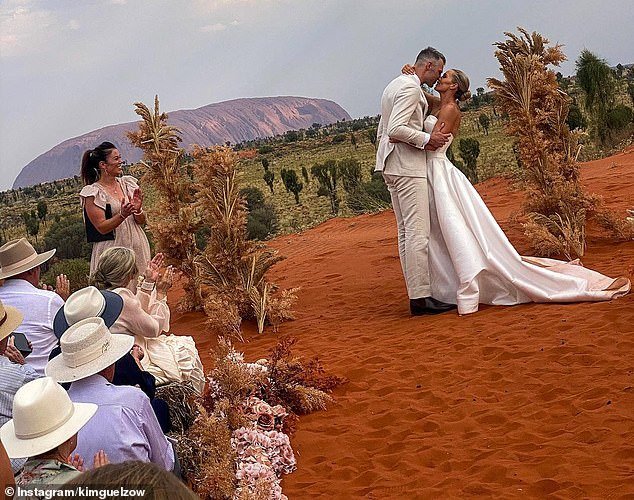 Abbey Holmes, a SAS Australia participant, ties the knot with AFL star fiancé Keegan Brooksby in a breathtaking desert wedding at Uluru.