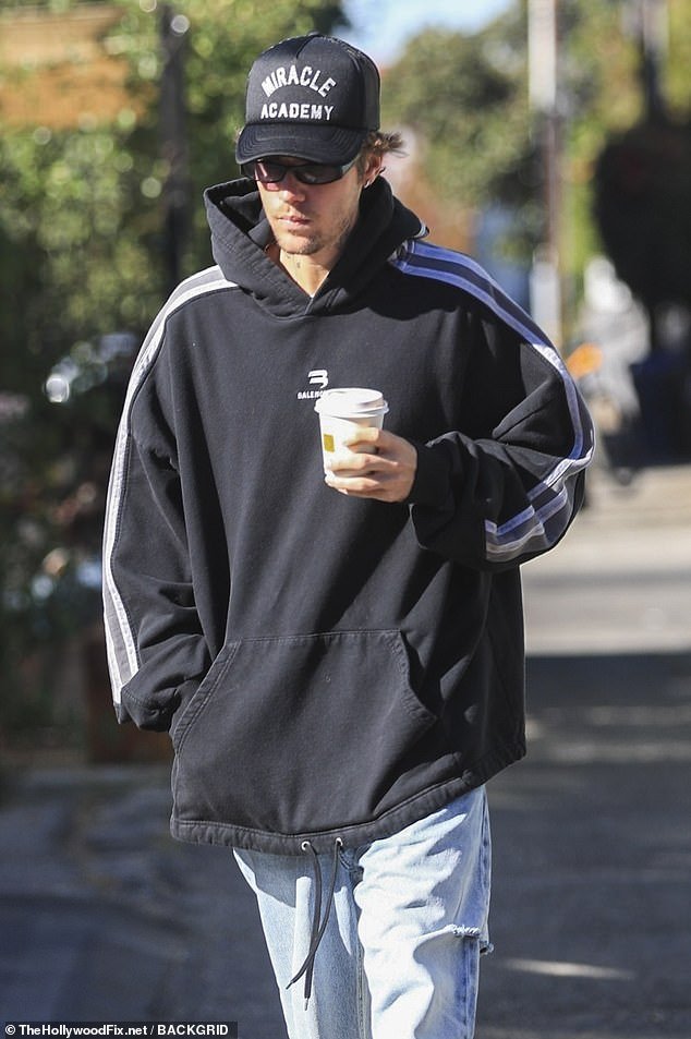 Justin Bieber spotted in a loose-fitting Balenciaga hoodie while getting coffee in West Hollywood