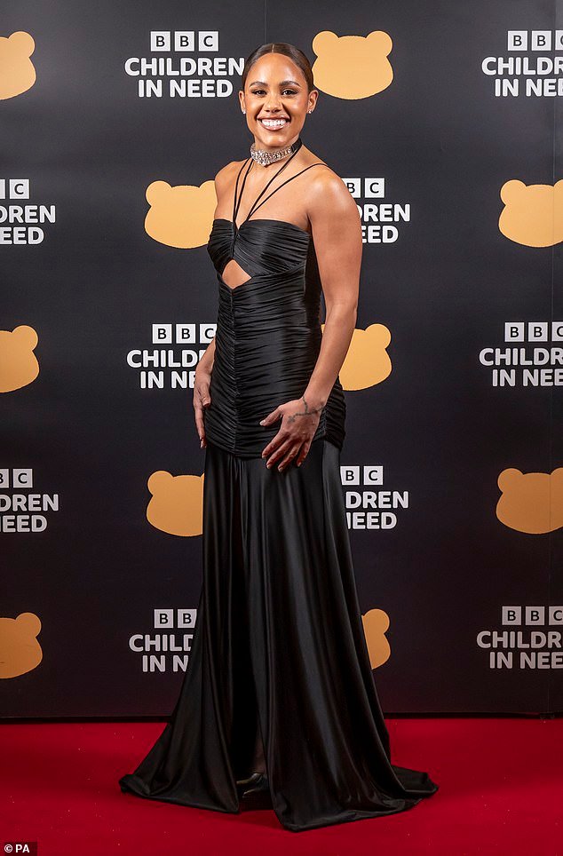 Alex Scott stuns in a black satin ruched gown as she hosts Children In Need 2023 in glamorous display