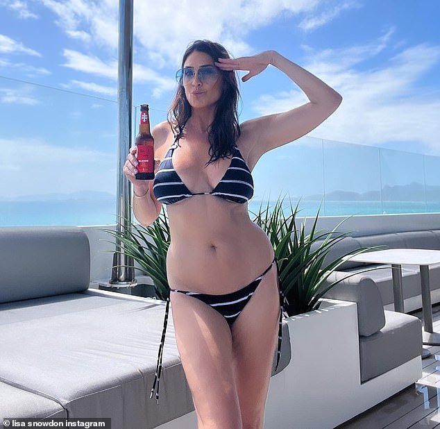 51 Year Old Lisa Snowdon Shows Off Her Stunning Figure In A Striped Halter Neck Bikini While