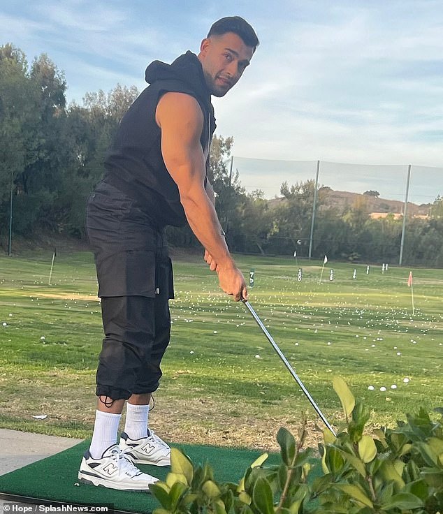 Sam Asghari visits the driving range as Britney Spears celebrates birthday with family.