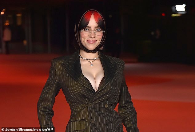 Billie Eilish wows in pin-striped suit at 3rd Annual Academy Museum Gala in LA after opening up about her sexuality on the red carpet