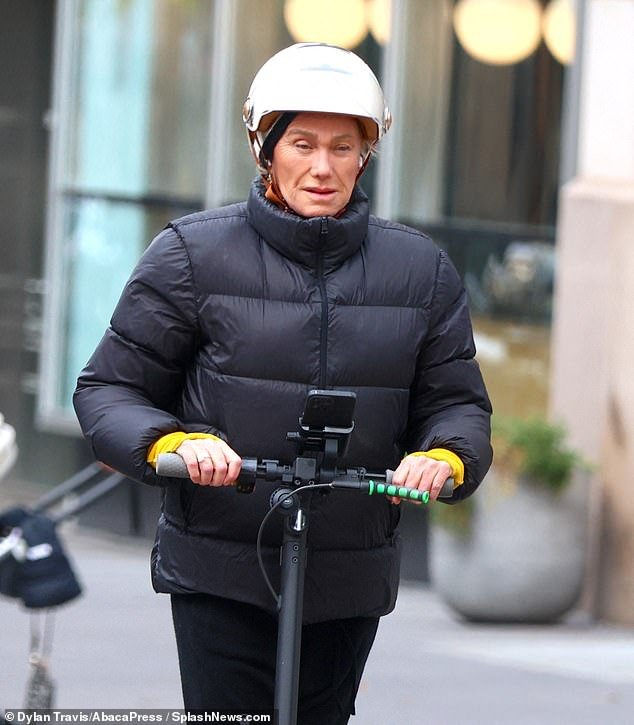 Deborra-Lee Furness appears somber as she rides a scooter through New York City, following fans’ response to Hugh Jackman’s ‘sad’ Instagram post.