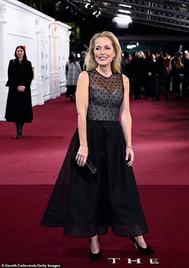 Gillian Anderson stuns in a black gown with a corset bodice at The