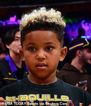 Kim Kardashian’s son Saint celebrates his 8th birthday with bleach blond hair and a tribute to soccer hero Neymar at LA Lakers game