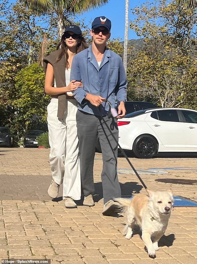 Kaia Gerber and boyfriend Austin Butler take a stroll with her dog Milo in Malibu, arm in arm