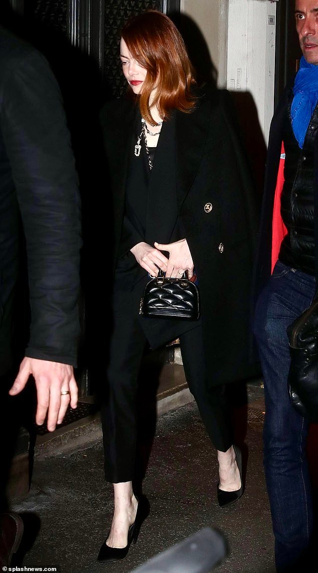 Emma Stone exudes elegance in a black suit at the Poor Things premiere in Paris following her Golden Globes nomination