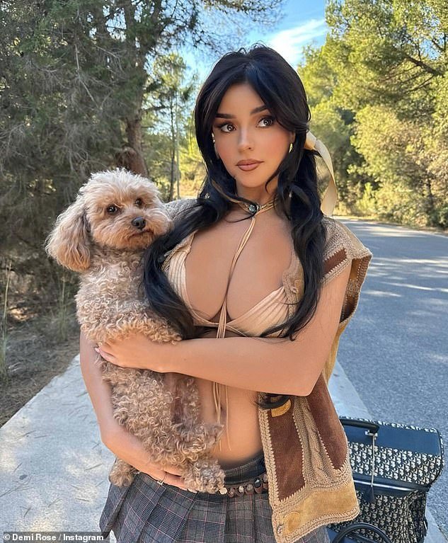 79256579 12893905 Demi Rose 28 showed off her ample assets in a nude bikini top an a 5 1703258786084