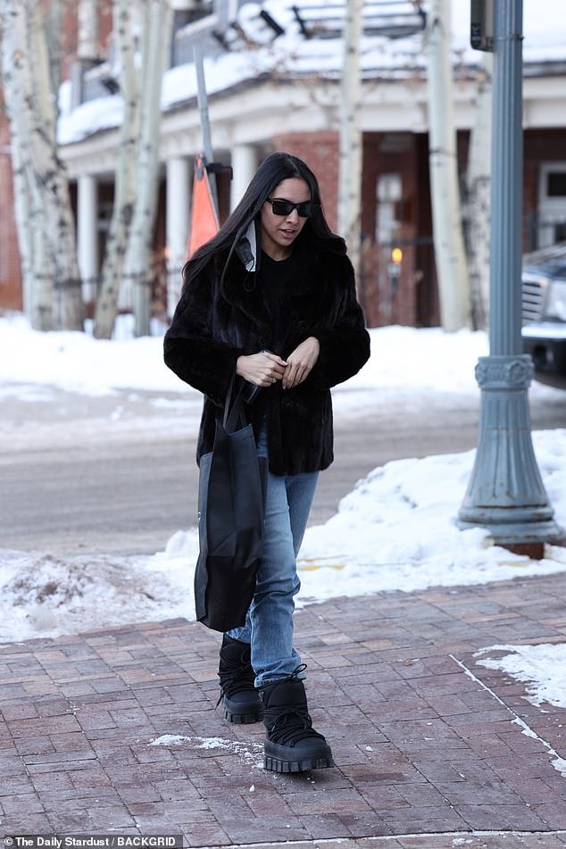 Al Pacino's baby mama Noor Alfallah flaunts fur coat and Prada boots