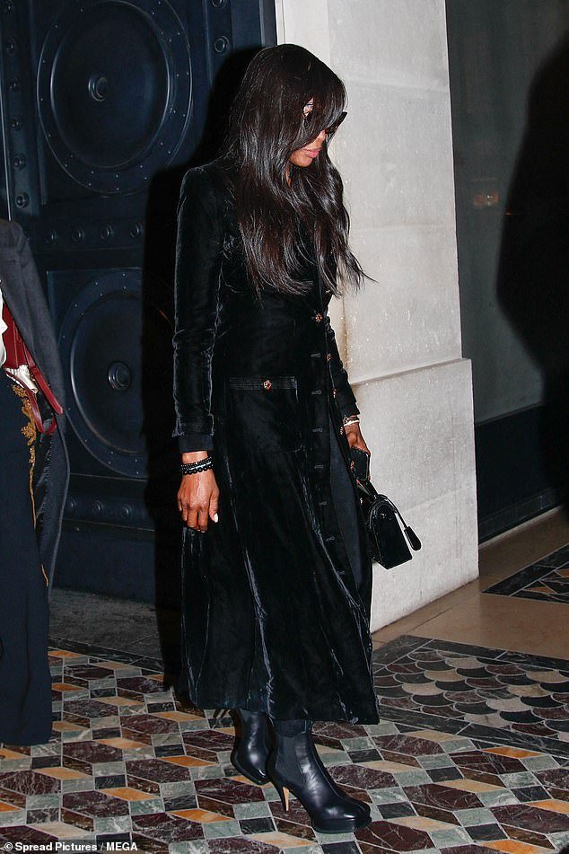 Naomi Campbell, 53, Maintains a Discreet Look in a Stylish Black Coat as She Leaves Her Hotel for Paris Fashion Week