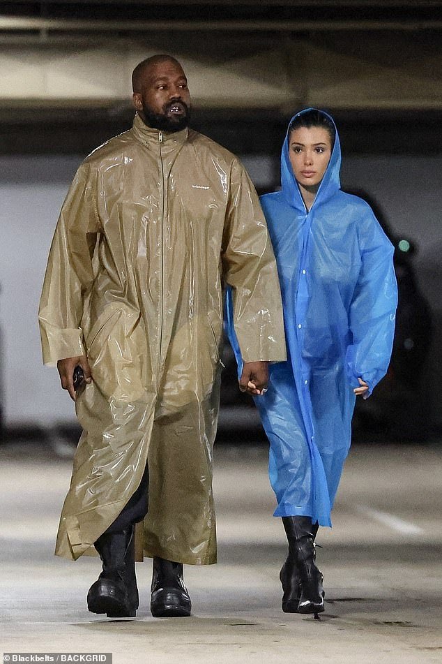 Kanye West spotted with wife Bianca Censori in Balenciaga raincoat following Kim Kardashian’s brand ambassador announcement