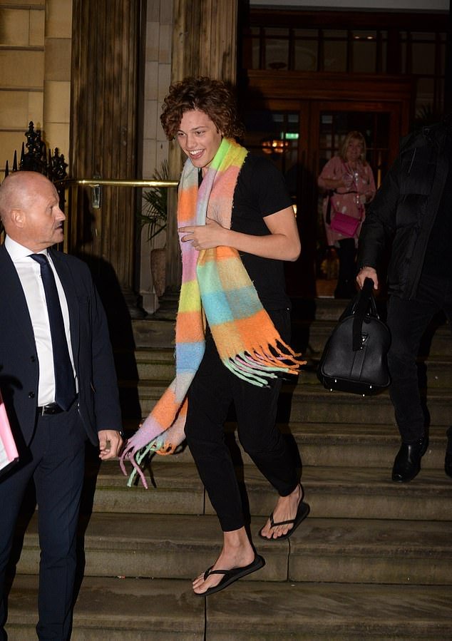 Bobby Brazier spotted wearing Ellie Leach’s scarf once more after Strictly live tour, sparking rumors of secret dates.