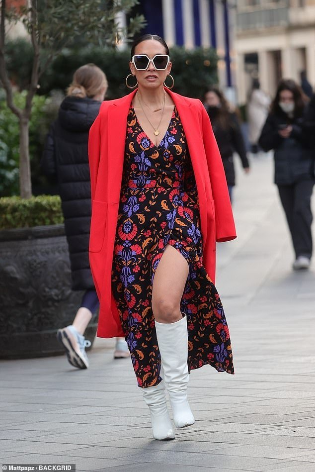 Myleene Klass showcases her legs in a stylish floral print dress on her way to work at Smooth Radio