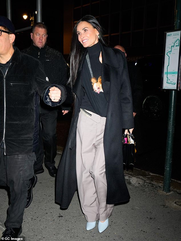 Demi Moore arrives at SNL afterparty in chic black top and trousers ...