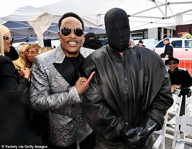 Kanye West’s Unusual Appearance at Charlie Wilson’s Hollywood Walk of Fame Ceremony Leaves Fans Surprised – Rapper Wears Black Face Covering for Star-Studded Event