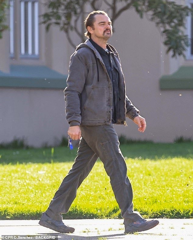 Leonardo DiCaprio dons a mustache and worn jacket for his role alongside Regina Hall and Maya Rudolph in Paul Thomas Anderson’s film shoot in Los Angeles