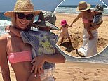 Jennifer Hawkins flaunts her stunning bikini physique while enjoying a beach day with husband Jake Wall and their children.