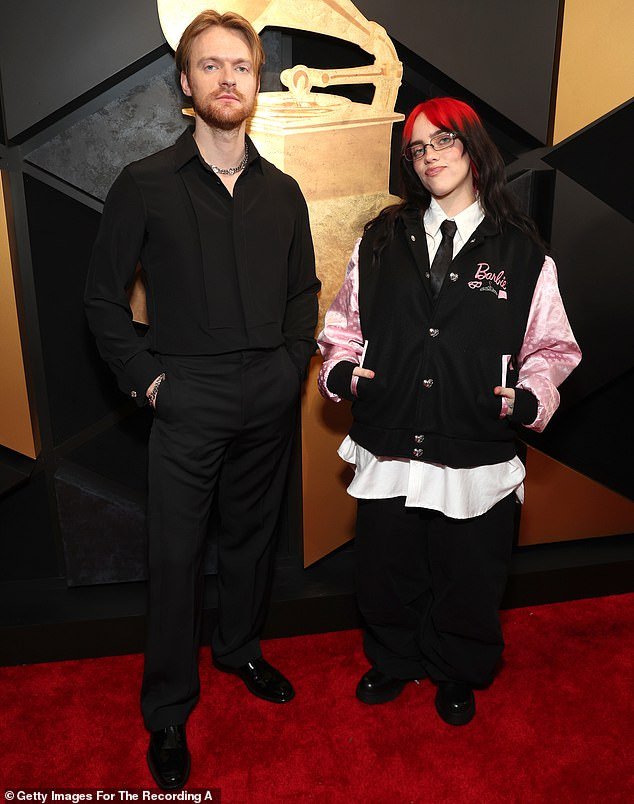 Billie Eilish and brother Finneas rock Barbie jacket on Grammys 2024 red carpet as they win for “What Was I Made For”