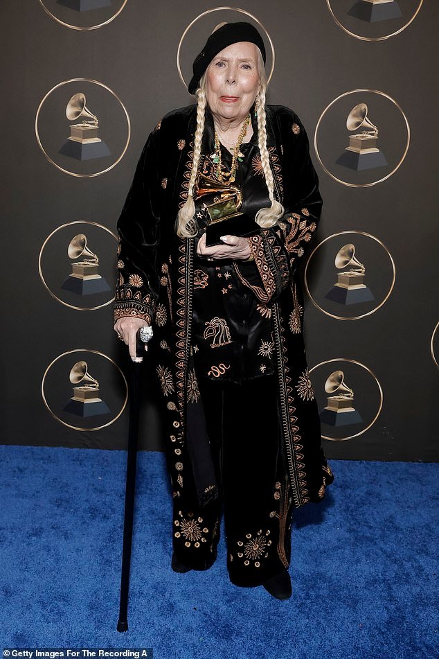 Joni Mitchell, 80, joyfully receives Grammy for Best Folk Album at At