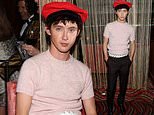 Troye Sivan flaunts his bold fashion sense at Gucci’s Grammys after-party in a vibrant red cap