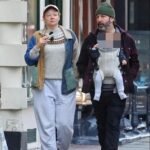 Succession actress Sarah Snook debuts her baby daughter during a day out in London with husband Dave Lawson, following their Emmys success