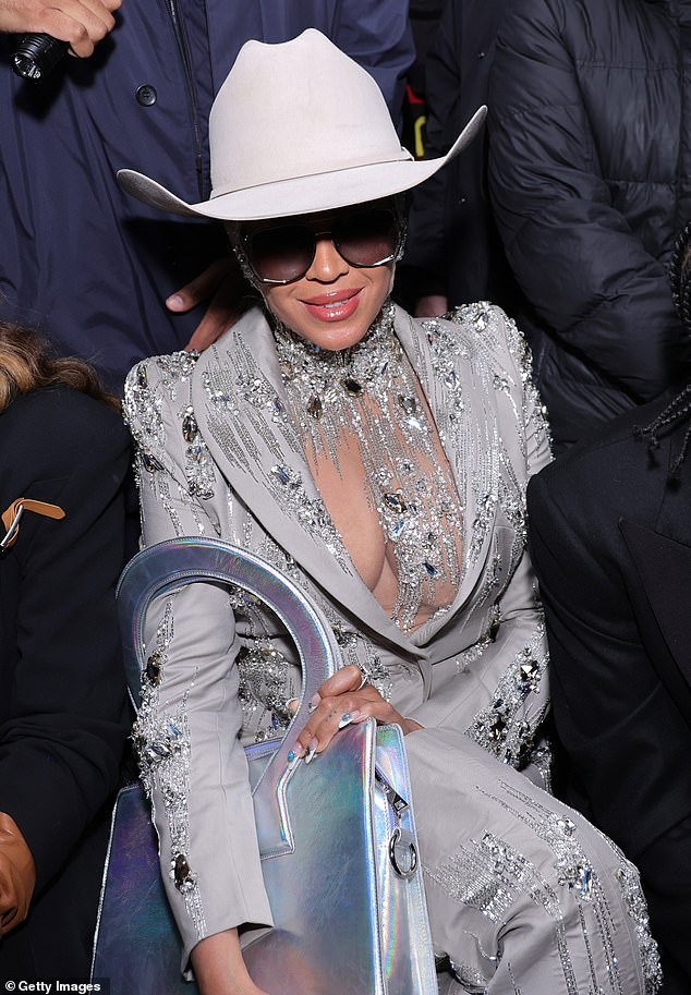 Beyonce and Mom Tina Knowles make a stylish appearance at Luar fashion show in cowboy hat and sparkling suit, following announcement of country album