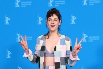 Kristen Stewart flaunts her toned physique in a bralet and mini skirt while promoting her lesbian thriller Love Lies Bleeding at Berlin Film Festival