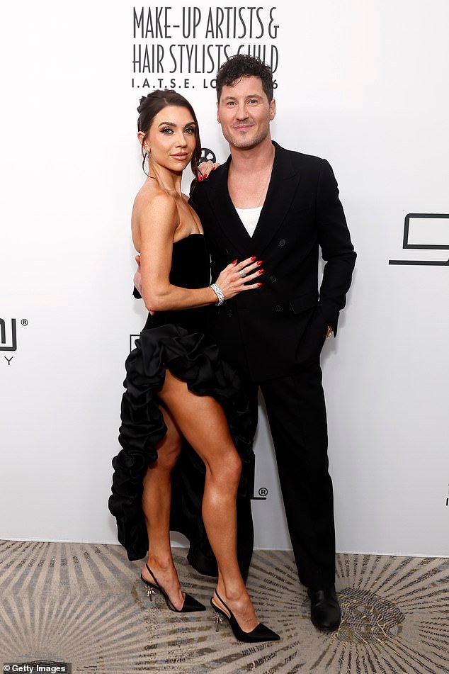 Jenna Johnson and Val Chmerkovskiy smooch in matching outfits at Make-Up Artists and Hair Stylists Guild Awards.