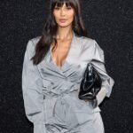 Maya Jama wows in a silver jumpsuit at the Alberta Ferretti show during Milan Fashion Week, following whirlwind travel schedule