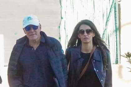 George and Amal Clooney sport matching denim outfits while fueling up their £69k Mercedes in the South of France, following their move to a £7m countryside estate.