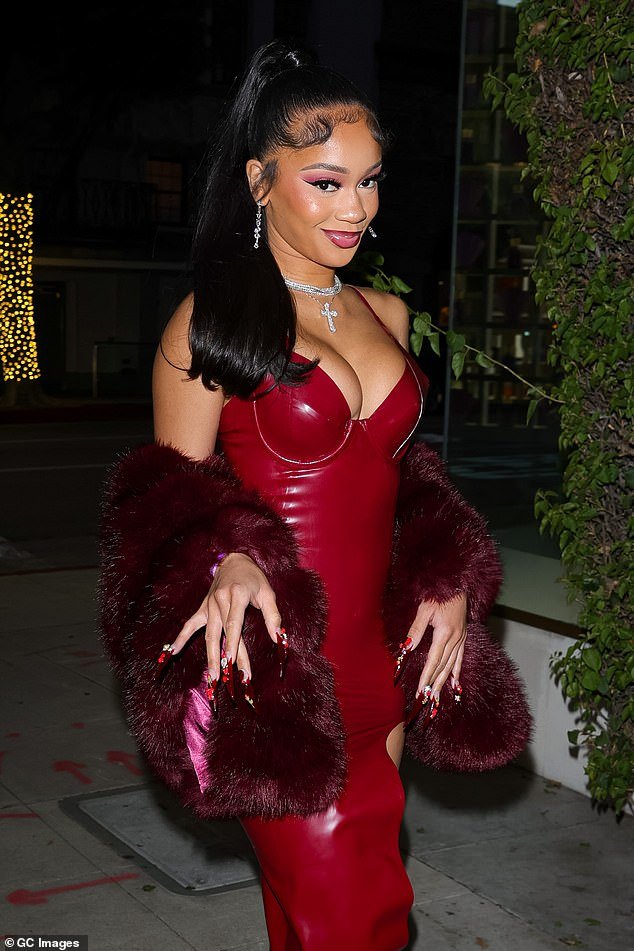 Saweetie turns heads in a stunning red dress with a daring leg slit during Los Angeles outing