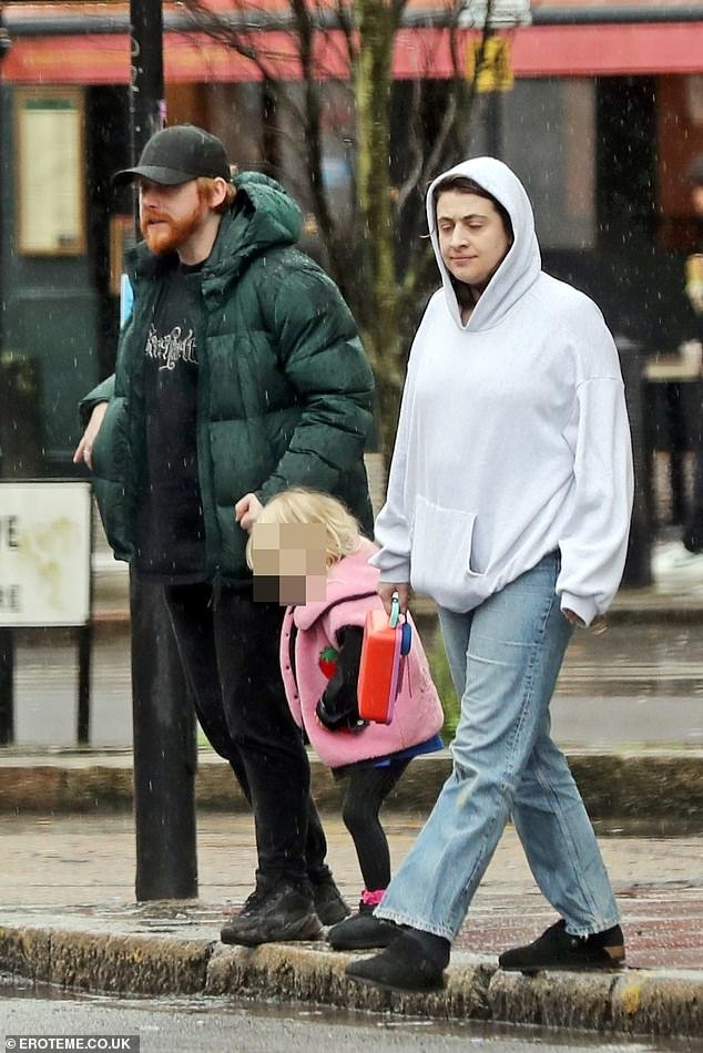 Rupert Grint and family bundle up in green coat for a special outing with partner Georgia Groome and daughter Wednesday