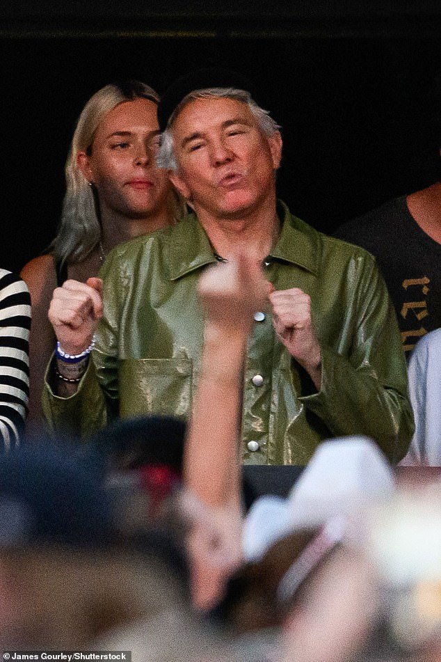 The Unconventional Marriage of Baz Luhrmann and Catherine Martin: Hollywood Pair Maintaining Separate Lives, with Her Attending Pilates Classes in Gold Coast While He Enjoys Dancing at Taylor Swift Concerts Without Her.