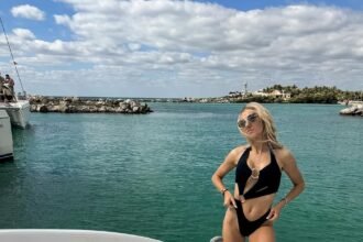 Brittany Mahomes flaunts her fit physique in a monokini while enjoying vacation following Super Bowl support for husband Patrick Mahomes