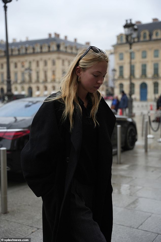 Lila Moss makes a chic statement in an oversized wool coat during Paris Fashion Week