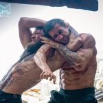 Jake Gyllenhaal displays his toned body in a shirtless wrestling scene with Conor McGregor in the upcoming 1980s reboot of Road House