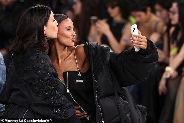 Maya Jama and Jessie Ware strike cheeky poses in selfies at Off-White show for Paris Fashion Week