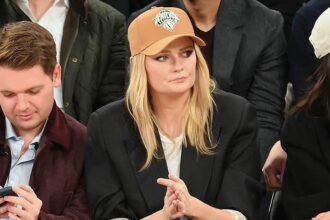 Mischa Barton shines at star-friendly New York Knicks game following confession of romance with The OC co-star Ben McKenzie