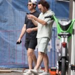 The Jonas Brothers, Nick and Kevin, enjoy a friendly game of tennis in Sydney before starting their Australian tour.