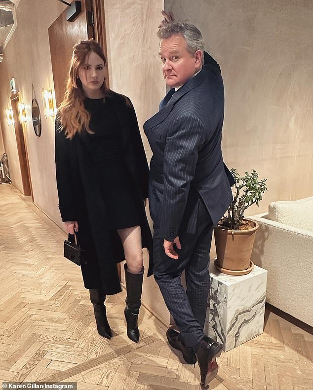 Karen Gillan flaunts her legs in a chic black dress while goofing off with co-star Hugh Bonneville during the promotional tour for “Douglas Is Cancelled”