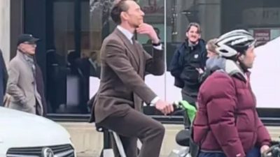 Avengers Star Spotted in London Riding Lime Bike in Suit – Did You Notice?