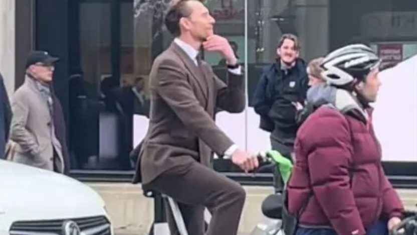 Avengers Star Spotted in London Riding Lime Bike in Suit – Did You Notice?